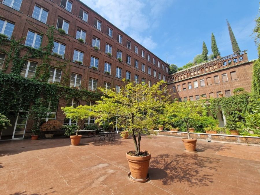 Cloister with a garden in central Milan